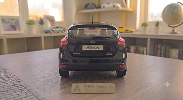 fort salon: Ford Focus 2014 modelinin 1:18 miqyaslı kolleksiya avtomobili. Model — 3