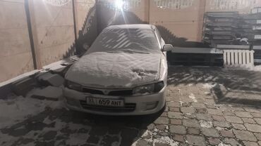 Mitsubishi: Mitsubishi Lancer: 1999 г., 1.3 л, Механика, Бензин, Седан