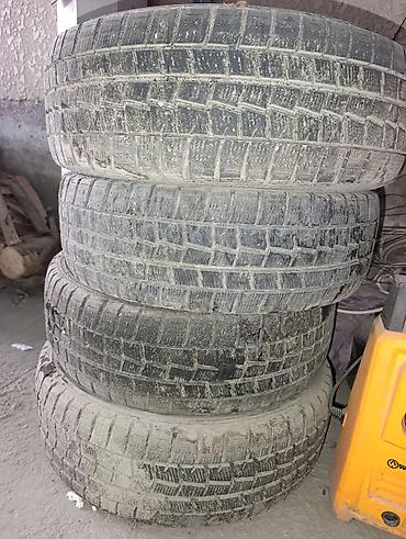 для зимы: Зимние шины Dunlop 155/65 R14 75Q - Комплект из 4 шин. - Размер — 2