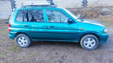 кредит машины: Mazda Demio: 1999 г., 1.4 л, Механика, Бензин, Хэтчбэк