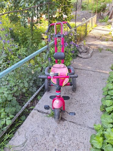 детский трёх колёсный велосипед: Коляска, цвет - Розовый, Б/у