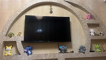 TV və video: LED televizor – divara quraşdırılmış, nazik korpuslu, qara rəng — 2