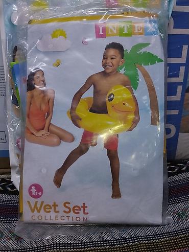 Надувной детский круг Intex Wet Set Collection в форме утёнка. -