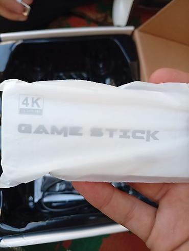 hot 50 pro plus: 2.4G Wireless Game Stick retro oyun konsolu seti Paket məzmunu: - 2 — 2