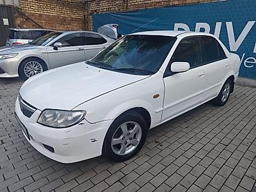 мазда вамиля: Mazda Familia: 2003 г., 1.5 л, Автомат, Бензин, Седан — 3