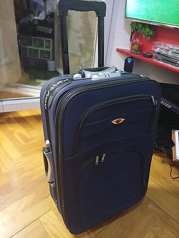 Putni koferi i torbe: Troler kofer Xinnuo – veliki, tekstilni, na točkiće OKO . 55 40 25 — 1