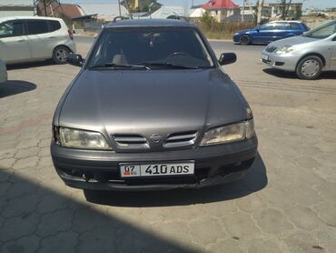 шины для фит: Универсал Nissan Primera серого цвета с вместительным салоном и