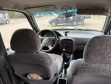 ленд ровер: Kia Sportage: 1997 г., 2 л, Механика, Дизель, Внедорожник — 4
