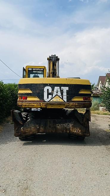 гусиничный экскаватор: Экскаватор, Caterpillar, Колесный — 4
