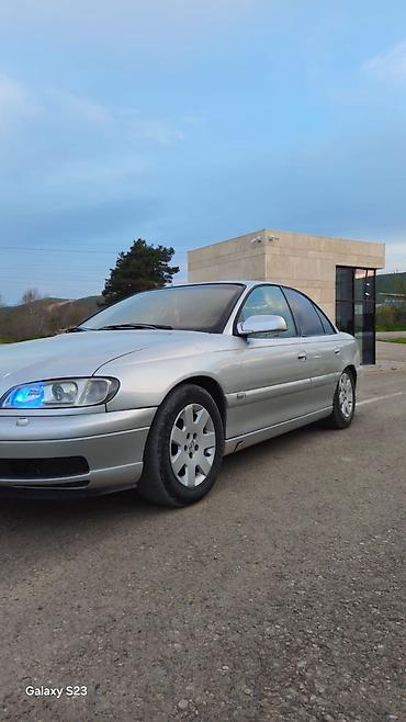 фольксваген пассат 1: Opel Omega: 2.2 л | 2001 г. 32756 км Седан — 3