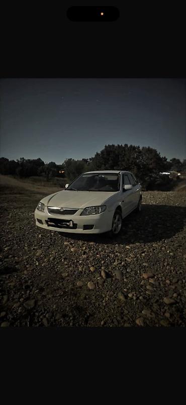 универса: Mazda Familia: 1999 г., 1.6 л, Механика, Бензин, Универсал — 2