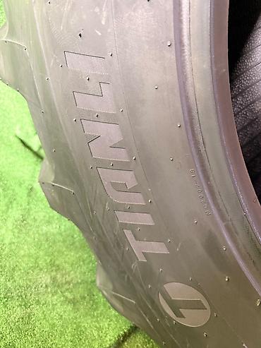 жёсткий тросс: 16.9-28 12PR Tianli шины для экскаватора погрузчика JCB 3CX — 2