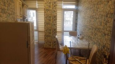 Digər kommersiya daşınmaz əmlakı: Yasamal rayonu nizami metrosuna yaxın 16 mərtəbəli binanın, 5-ci — 7