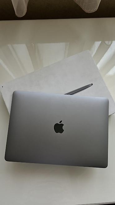 macbook air m4: Apple MacBook Air (Space Gray) – 13" seriyası Xüsusiyyətlər: - 13.3" — 1
