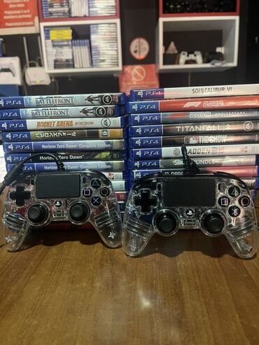 Video oyunlar üçün aksesuarlar: Bu iki şəffaf gamepad PS4 konsolları üçün nəzərdə tutulmuşdur. Şəffaf