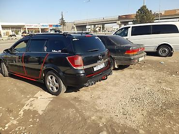 şevralit avtomobil: Opel Astra: 1.3 l | 2006 il Universal — 3