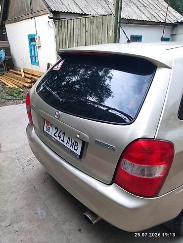 e53 amg: Mazda Familia: 2002 г., 1.6 л, Универсал — 4