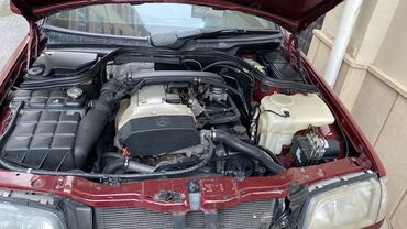 Mercedes-Benz: Mercedes-Benz C‑Class sedan (W202), al qırmızı rəng. - Kuzov: 4 — 9