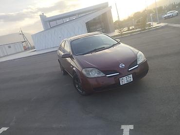 kia ev: Nissan Primera: 2002 г., 1.8 л, Механика, Газ, Лифтбек — 3