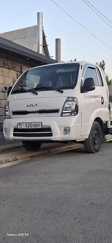mitsubishi toppo: Kia Bongo III (K2500/K2700) бортовой малотоннажный грузовик, левый — 1