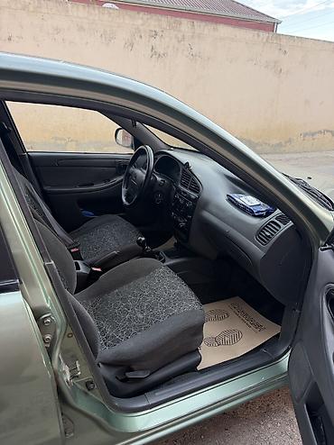 Daewoo: Daewoo Lanos: 1.5 l | 2010 il Sedan — 13