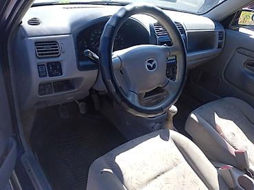 срв талас: Mazda Demio: 2000 г. — 4