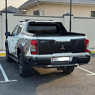crv 2: Mitsubishi L200: 2023 г., Механика, Бензин, Пикап — 5