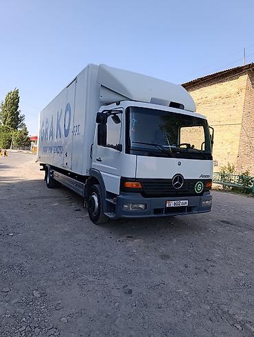 Грузовик Mercedes-Benz Atego фургонного типа. грузоперевозки переезды