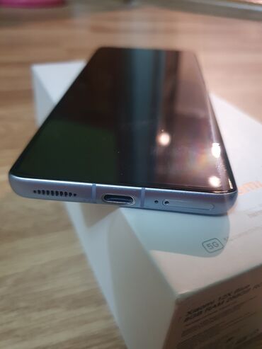 Xiaomi: Xiaomi 12X, rəng - Bənövşəyi, 
 Barmaq izi — 3