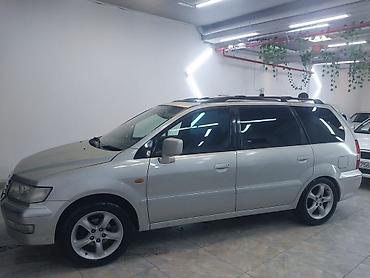 mitsubishi lancer evolution: Mitsubishi Chariot Grandis – 7 yerlik geniş ailə miniveni — 9