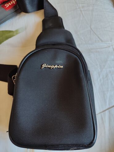 фото сумка: Барсетка не большая,компактная с двумя карманами