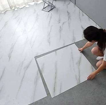 Ostalo: Podne obloge gumirane 
Samolepljive 
Cena po komadu 350 din
60*60cm — 1