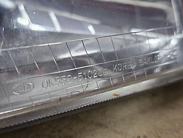 sedona: Передняя правая фара Kia 1999 г., Б/у, Оригинал — 9