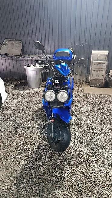 Скутер 50–150 см³ (класс Honda Zoomer/Ruckus-стайл), с ярким тюнингом