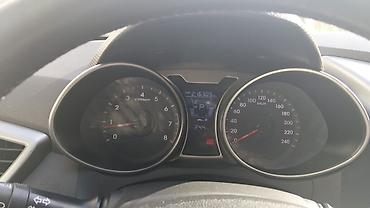 Hyundai: Hyundai Veloster, qara rəng, 3 qapılı (iki tərəfdə asimmetrik qapı — 10