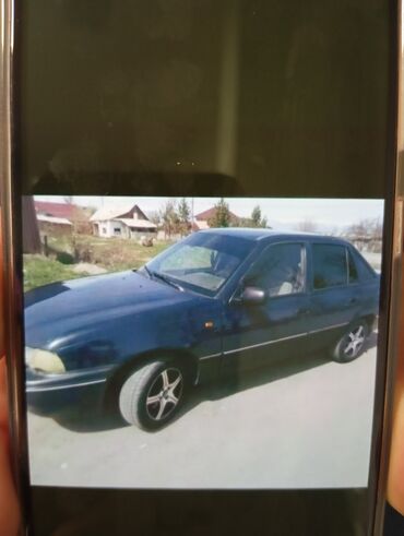 део спарк: Daewoo Nexia: 2005 г., 1.6 л, Механика, Бензин, Седан