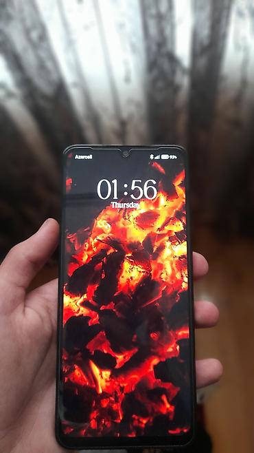 islemis soyuducu: Smartfon – damcı şəklində ön kamera çıxıntısı olan tam ekranlı model — 1