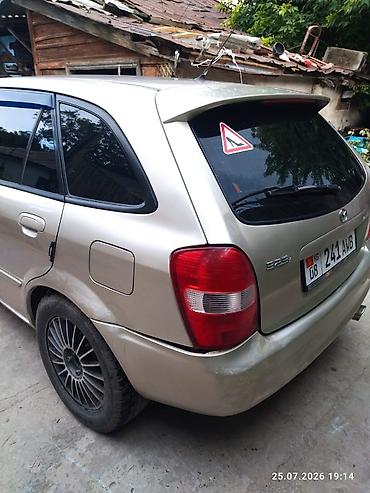 e53 amg: Mazda Familia: 2002 г., 1.6 л, Универсал — 5