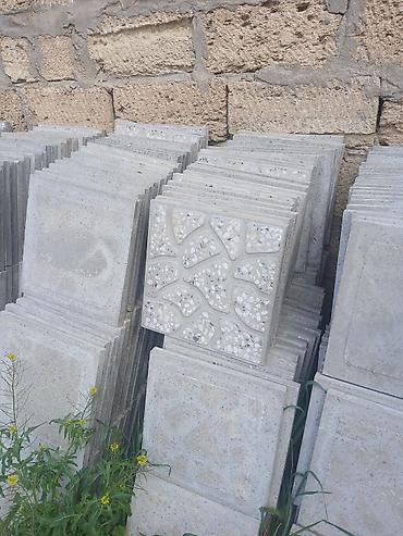 beton kəsən: Yere dosenen tamet 30×30 olcusunde surusmezdir 700 eded dasdi 63² di — 1