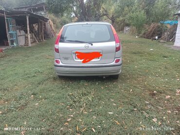 украшения на машину: Nissan Almera Tino: 2004 г., 1.8 л, Механика, Бензин, Универсал