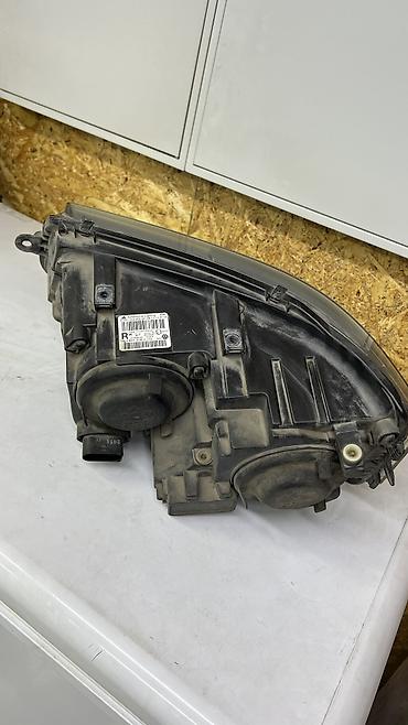 Передние фары: Передняя левая фара Volkswagen 2011 г., Б/у, Оригинал, Германия — 2