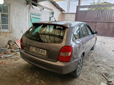 фара форестер: Mazda 323: 2003 г., 1.6 л, Механика, Бензин, Хетчбек