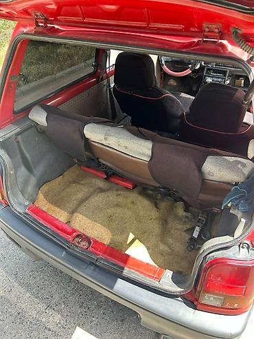 дайхатсу гран мув: Daihatsu Cuore: 1992 г., 1 л, Автомат, Бензин, Хэтчбэк — 5