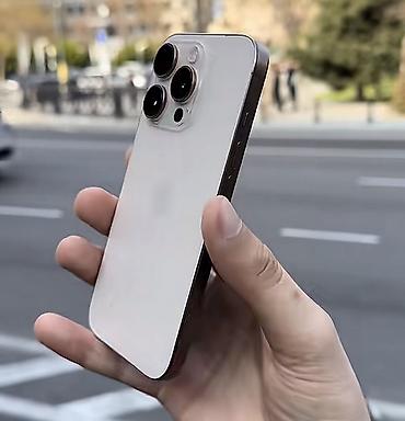 electronics iphone: IPhone 16 Pro, 128 GB, Desert Titanium, Barmaq izi, Face ID, Simsiz şarj — 1
