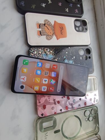 Redmi: Redmi 12 8_RAM__'128GB yaddaş TƏZƏ vəziyyətdə. Hec bir qirigi çati — 13