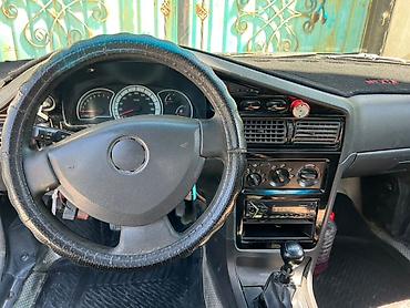 дэу матиз 1: Daewoo Nexia: 2013 г., 1.6 л, Кол менен иштөөчү, Бензин, Седан — 5