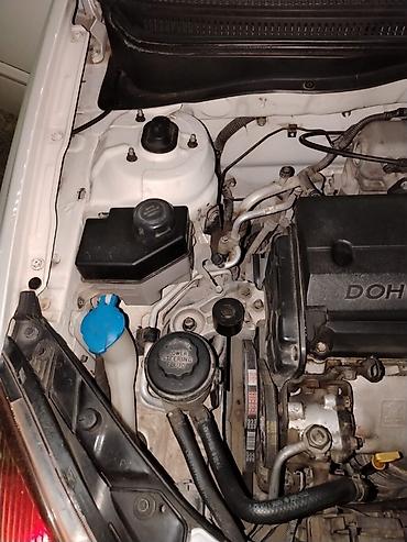 Kia: Kia Rio: 1.4 l | 2010 il Sedan — 15