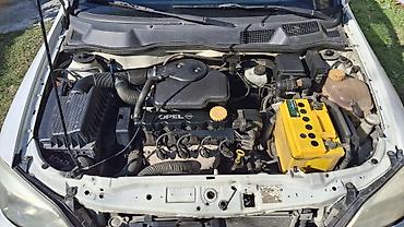 avtomobil kreditlə: Opel Astra Caravan (Universal) – ağ rəngdə, 5 qapı Mühərrik və — 9