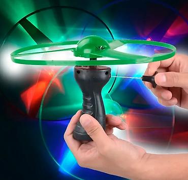 Ostalo: Nov svetleći leteći disk. Ima tri LED boje crvena, zelena i plava — 7
