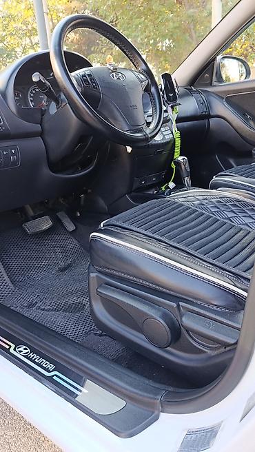 taube kondisioner: Hyundai Elantra, ağ rəngli sedan.nömre üstünde verilir peredok arxa — 6